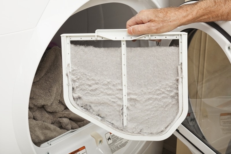 Lint accumulation around the dryer vent opening